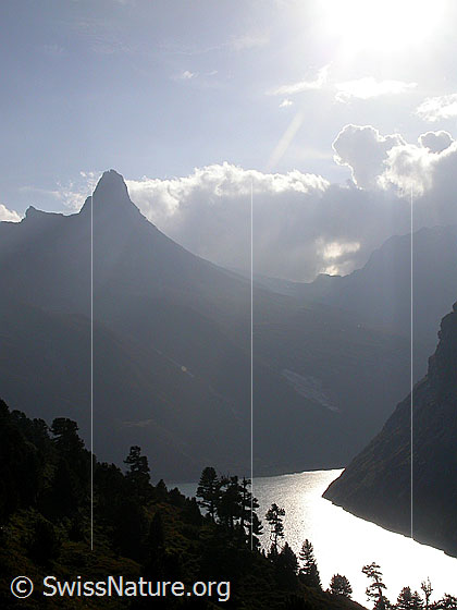 Foto: Zervreilahorn und Zervreilasee im Gegenlicht.