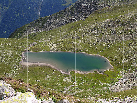 Foto: Im Abstieg vom Risihorn. Blick auf den Spilsee.