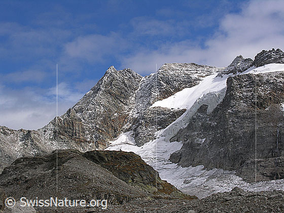 Foto: Tälli mit leicht verschneitem Ofenhorn und Tälligletscher.