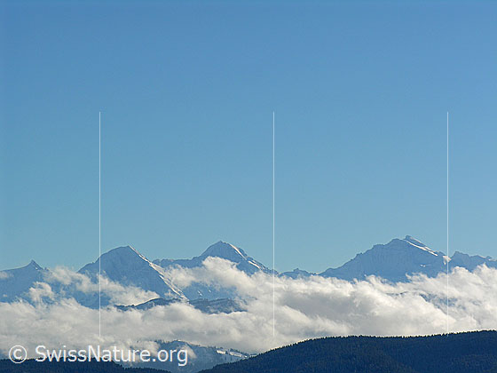 Foto: Eiger, Mönch Jungfrau und Wolken.