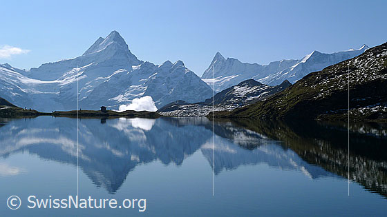 Foto: Spiegelung einer Alpenkette im Bachalpsee.