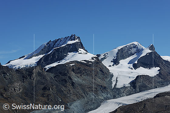 Foto: Rimpfischhorn, Strahlhorn und Adlerhorn. Gletscher: Mellichgletscher (links), Adlergletscher (rechts oben) und Findelgletscher (rechts unten).
