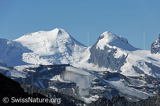 Foto: Zwillinge Castor und Pollux mit Zwillingsgletscher und Schwärzegletscher. Die Übergänge Felikjoch, Zwillingsjoch und Schwarztor sind gut erkennbar.
Vordergrund: Stockhorn und Triftjigletscher
