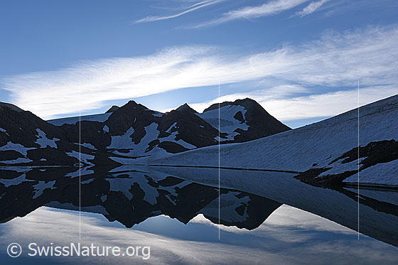 Foto: Spiegelung einer Morgenstimmung im Bergssee.