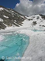 F024258: Türkisfarbener Bergsee mit Eisschollen