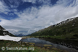 F068751: Aufreissende Wolkendecke über dem Halsesee